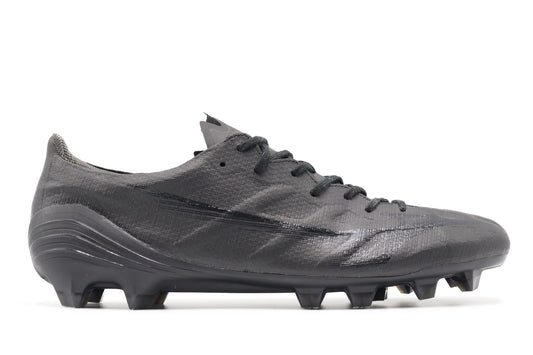 Mizuno Alpha Elite Made In Japan FG 'Sample', in a fully black colorway, photographed from the right side of the football boot