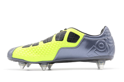 Nike Total 90 Laser Elite SG, in the Metallic Blue Dusk/Volt/Black colorway, photographed from the left side of the football boot