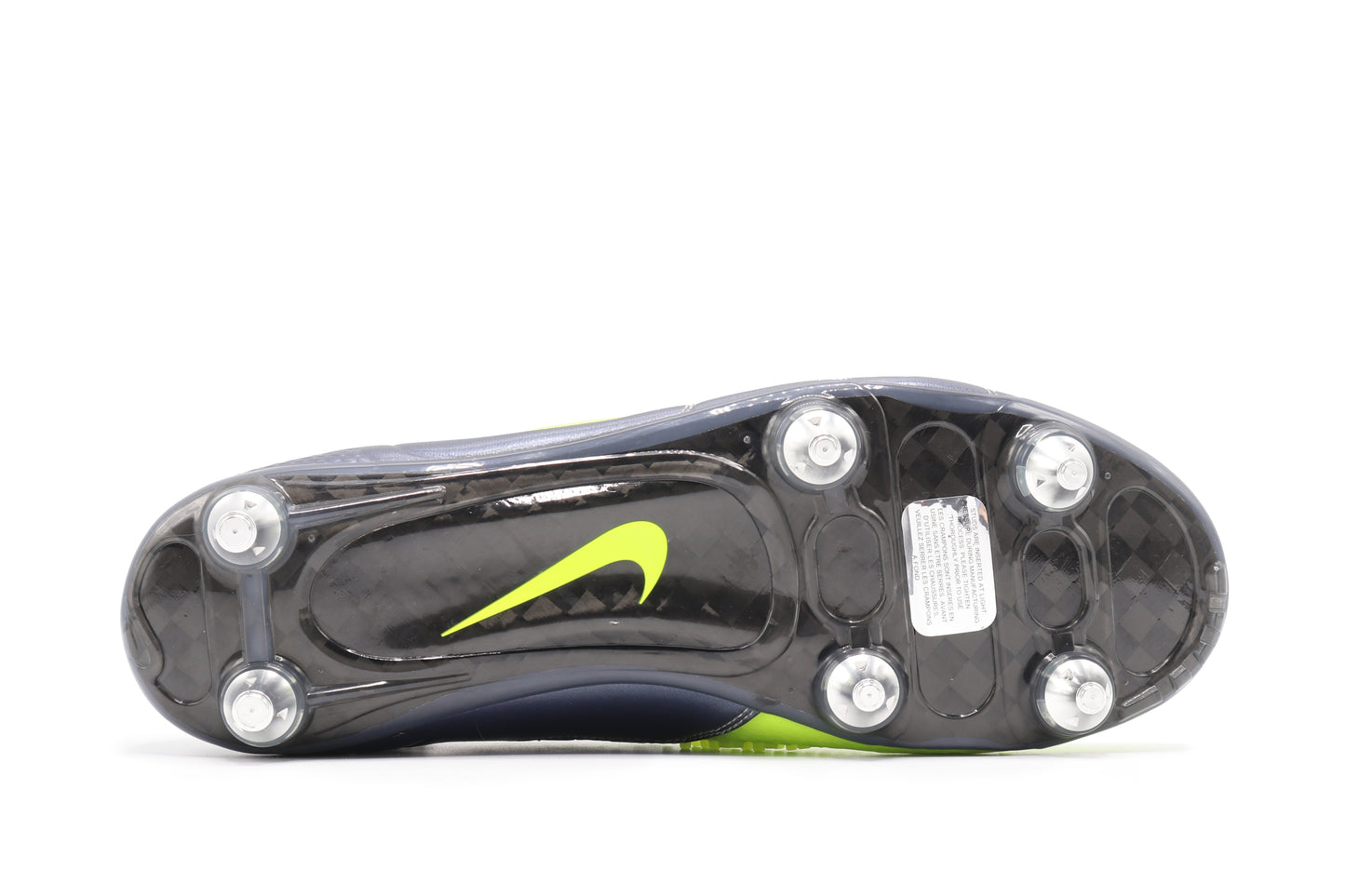 Nike Total 90 Laser Elite SG, in the Metallic Blue Dusk/Volt/Black colorway, photographed from the bottom side of the football boot, showing the soleplate