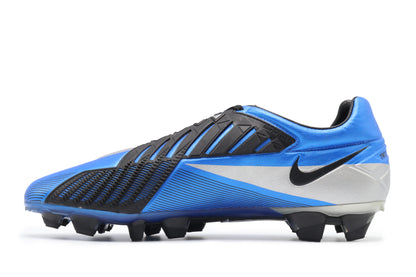 Nike Total 90 Laser IV KL-FG, in the Soar/Black/Metallic Silver colorway, photographed from the left side of the football boot